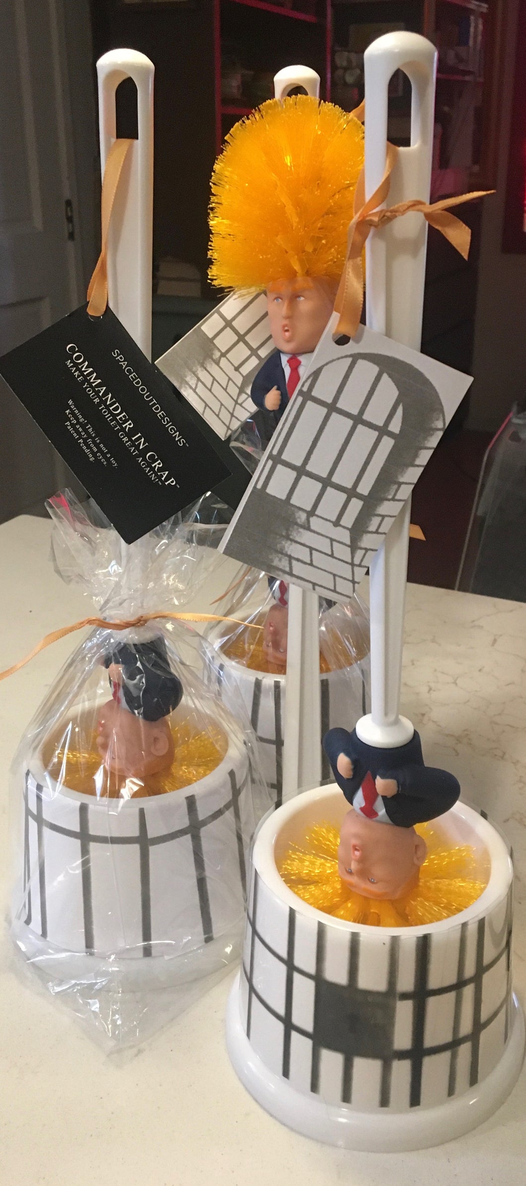 Trump toilet brush, Commander in crap, limited edition prison bar bucket. When he’s not scrubbing he’s sitting in his cell.