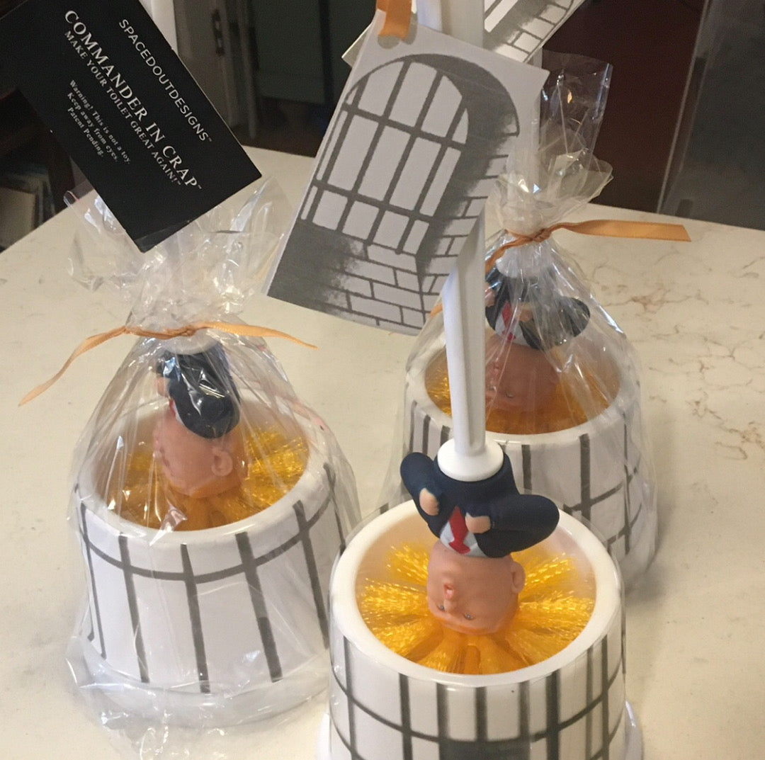 Commander in Crap Donald Trump Toilet Brushes with jail cell holders in packaging